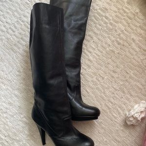 BCBG Woman’s boot all leather size 8 1/2 3 inch heel with a platform